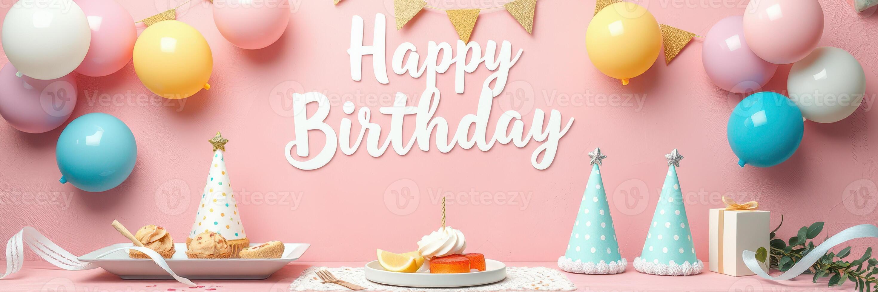 Colorful birthday celebration setup with decorations, cake, and cookies on a pink background for a memorable party photo
