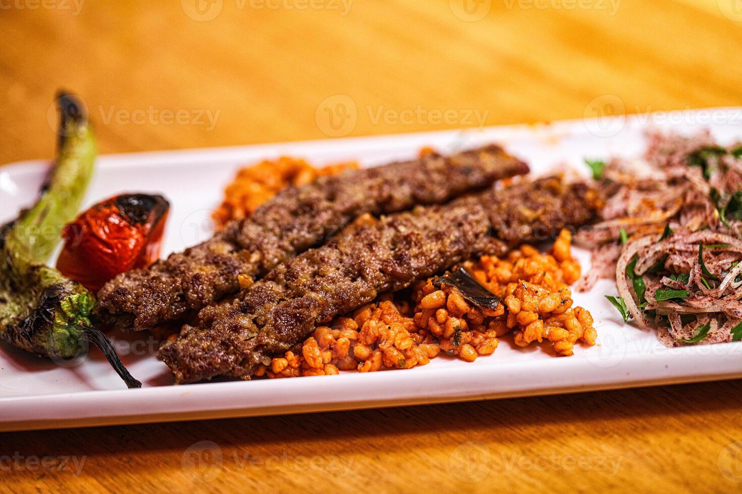 Turkish adana kebab with vegetables photo