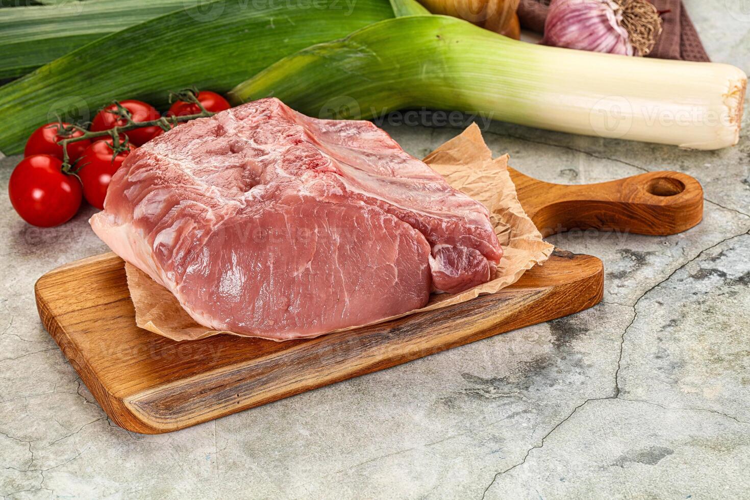 Raw pork loin cut with bone photo