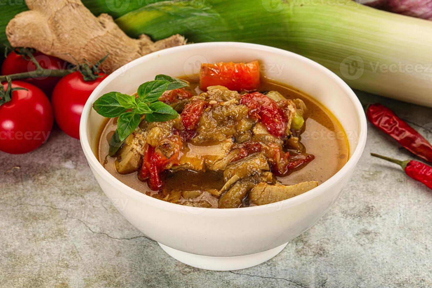 Thai curry with chicken and basil photo