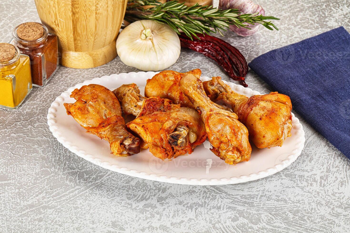 Raw marinated chicken drumstick for cooking photo