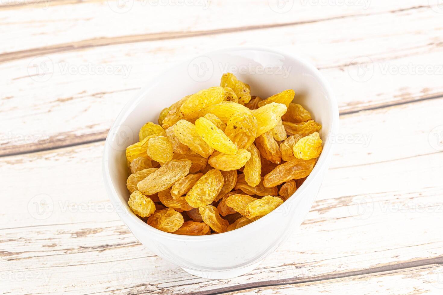 Yellow raisin - dry grape berries photo