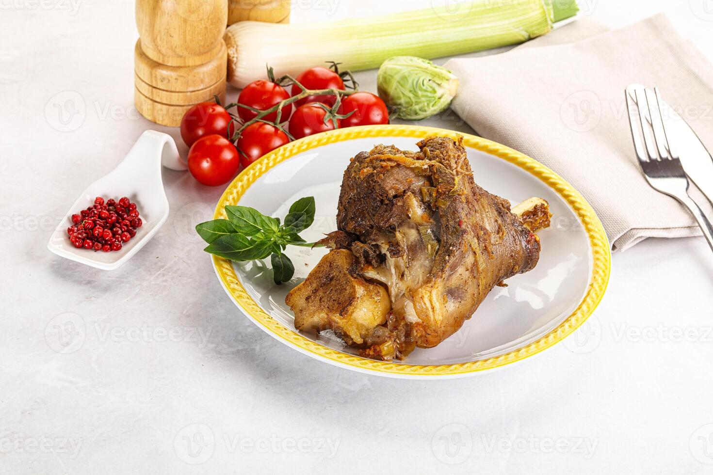 Baked Lamb shank with bone photo