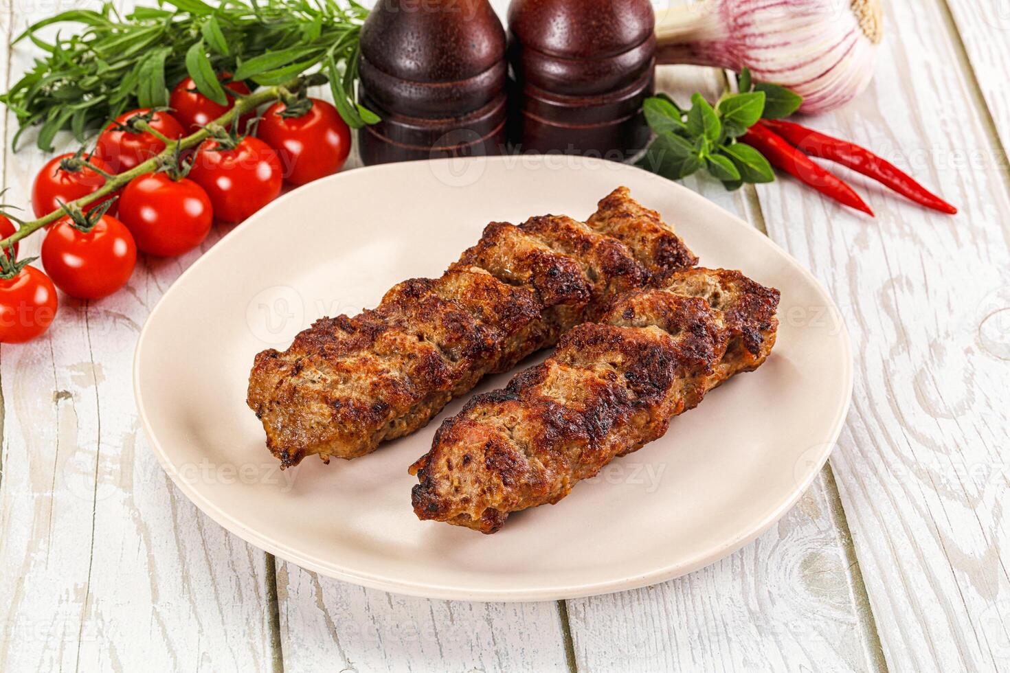 Chicken kebab minced meat and spices photo