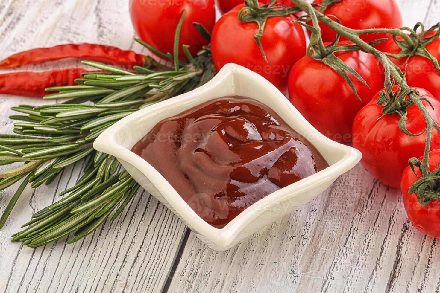 Tomato barbecue sauce on the bowl photo