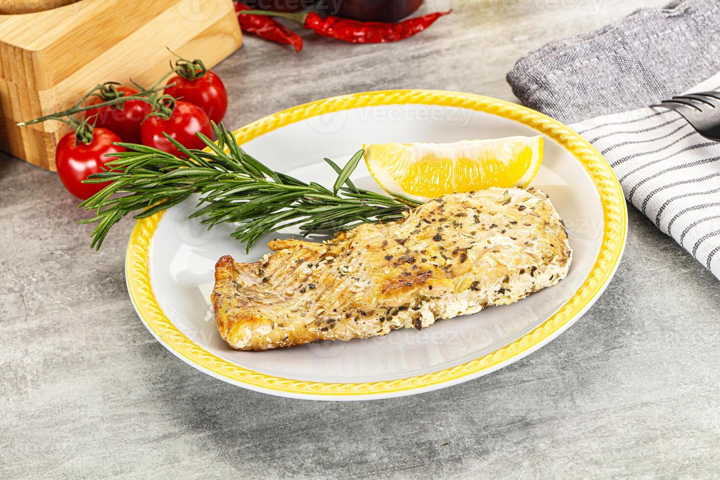 Baked salmon fish served rosemary photo