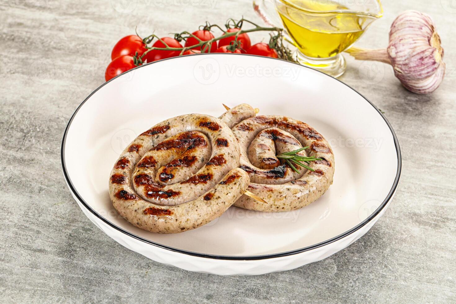 Grilled natural spiral meat sausage photo