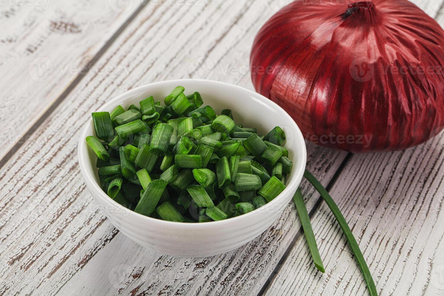 Diced green onion in the bowl photo