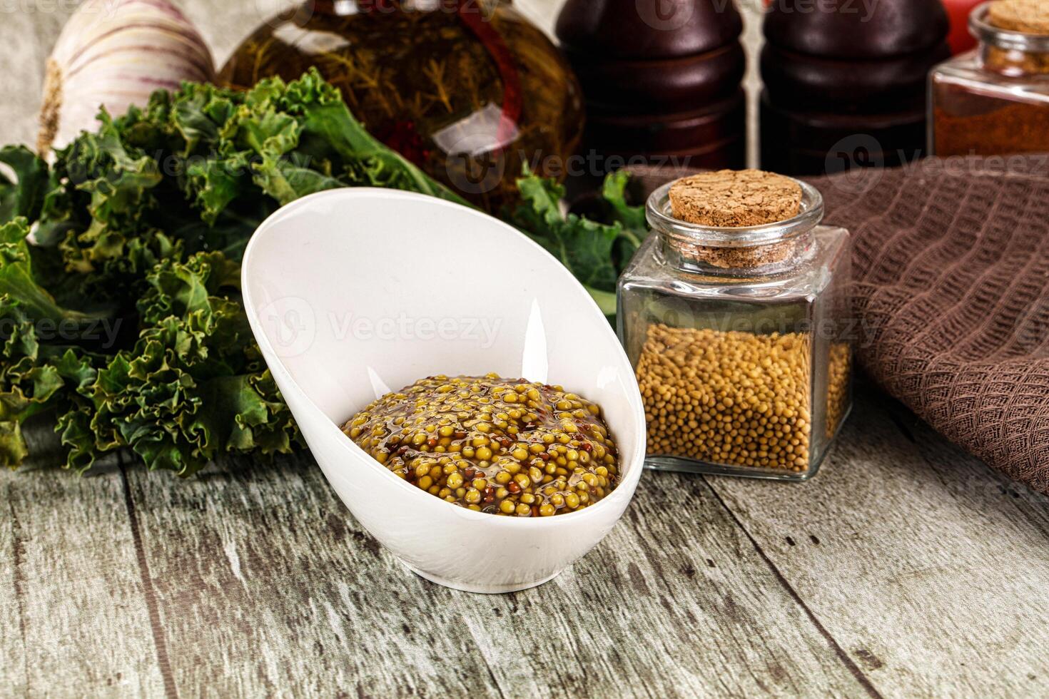 Mustard sauce with seeds in the bowl photo