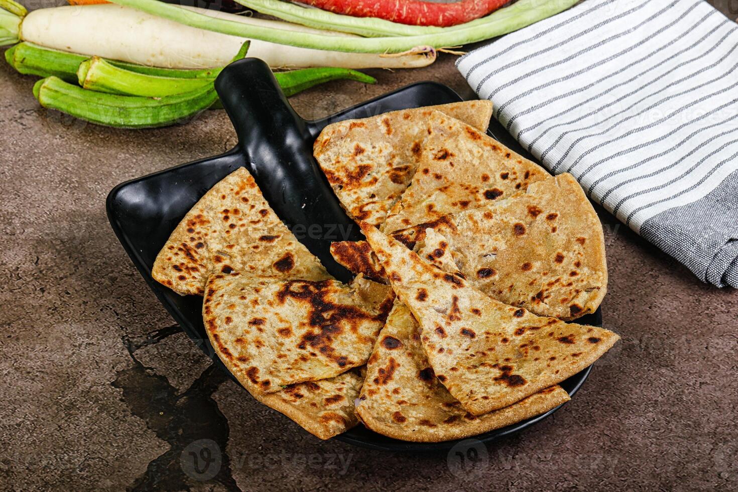 Indian Aloo Paratha - bread with potato photo