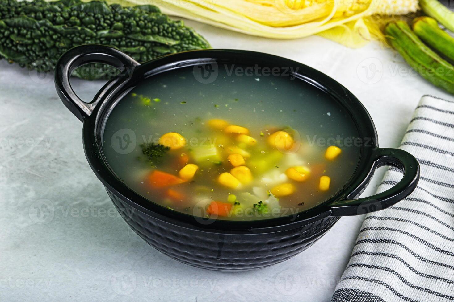 Soup with corn and broccoli photo