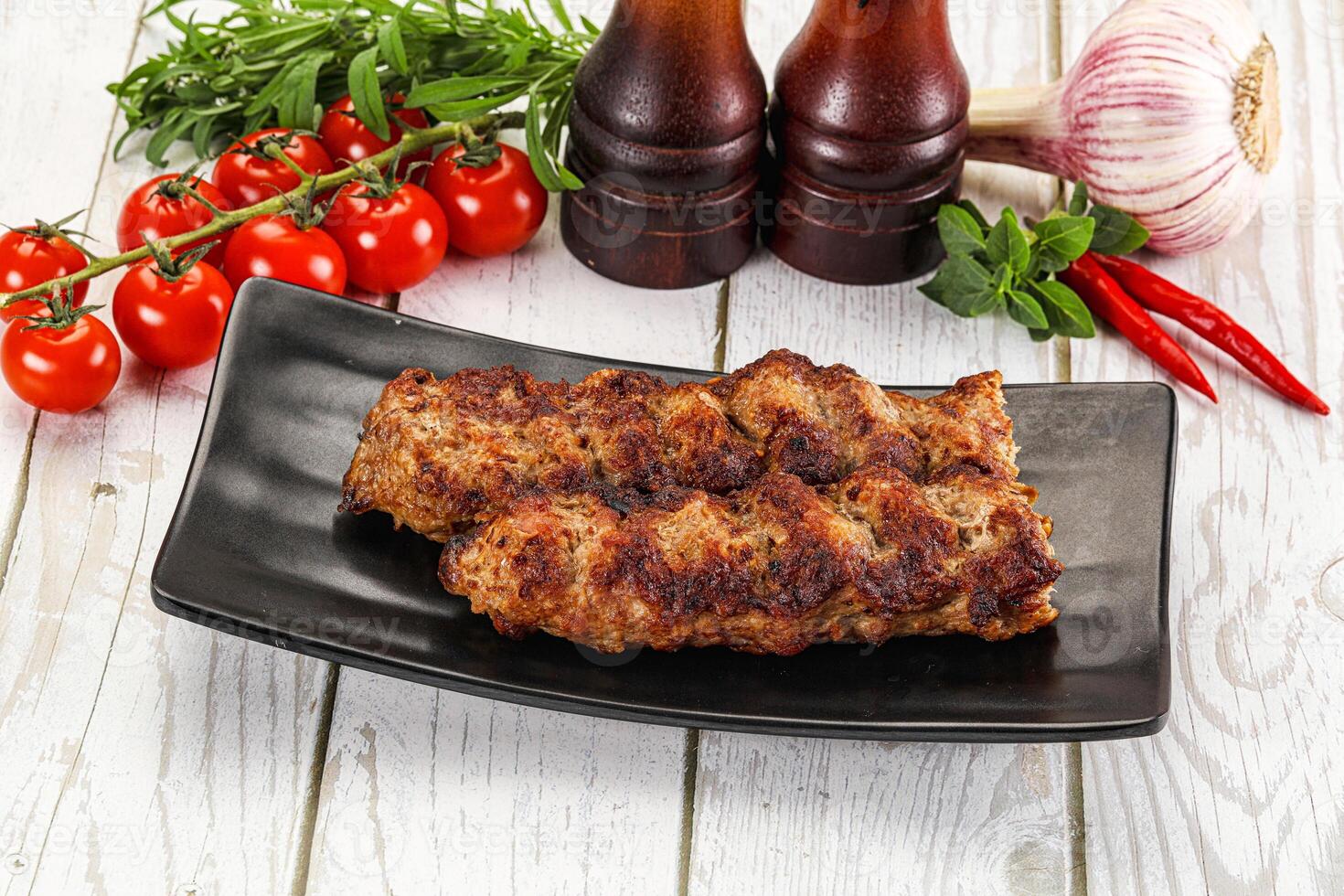 Chicken kebab minced meat and spices photo