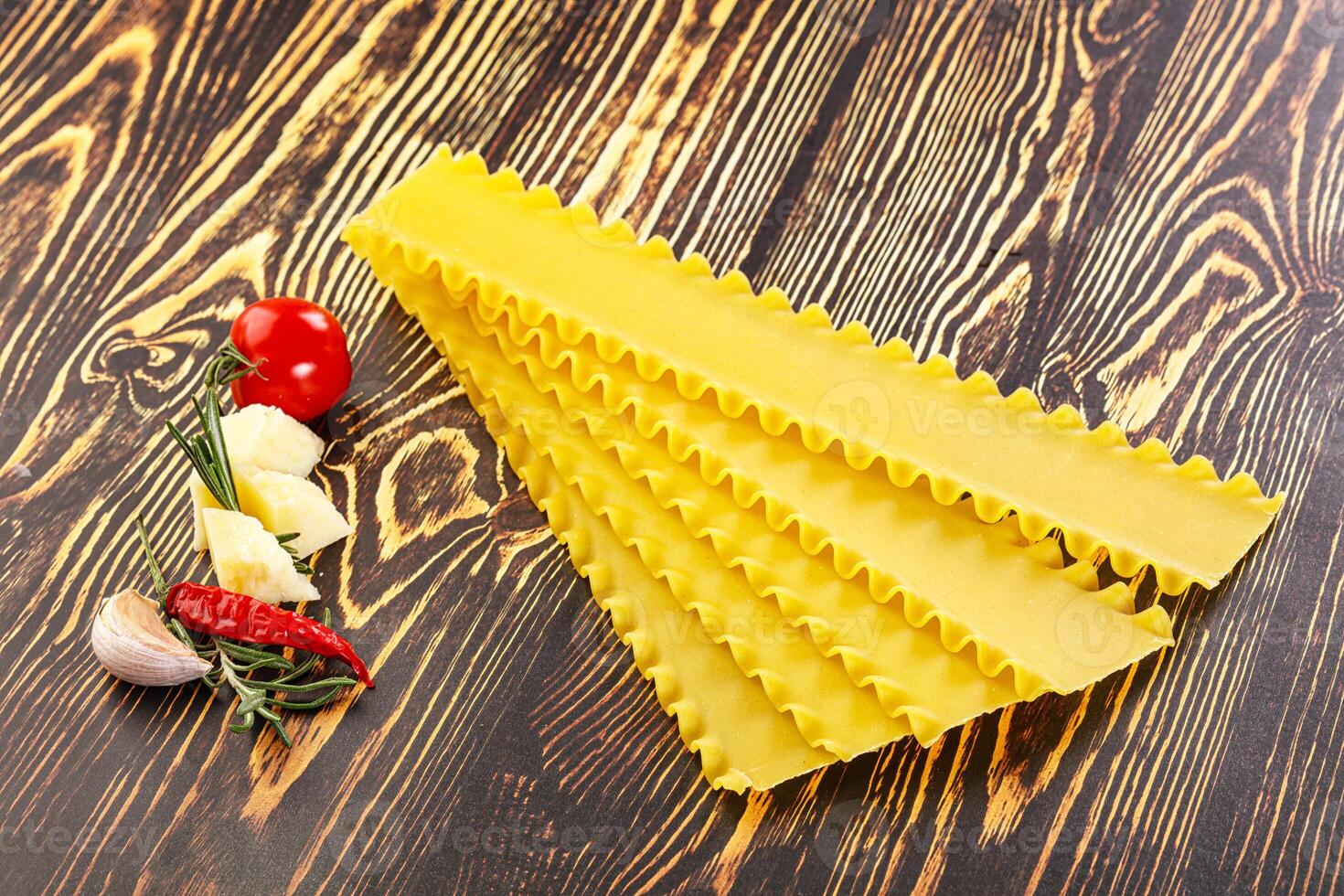Uncooked raw Lasagna dry sheets photo