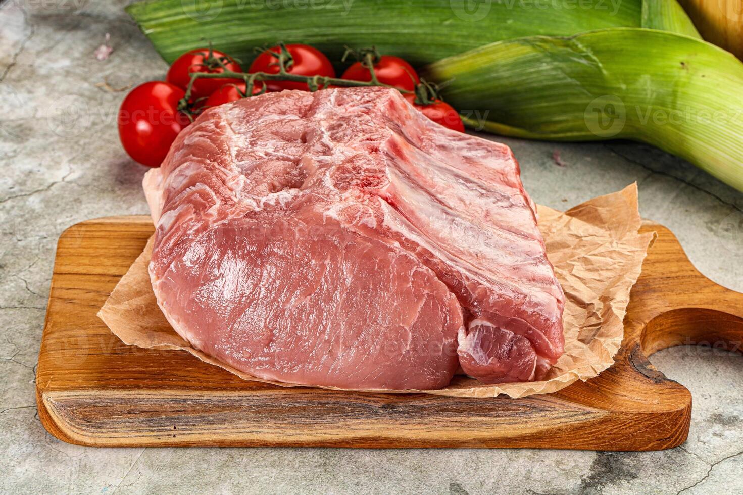 Raw pork loin cut with bone photo