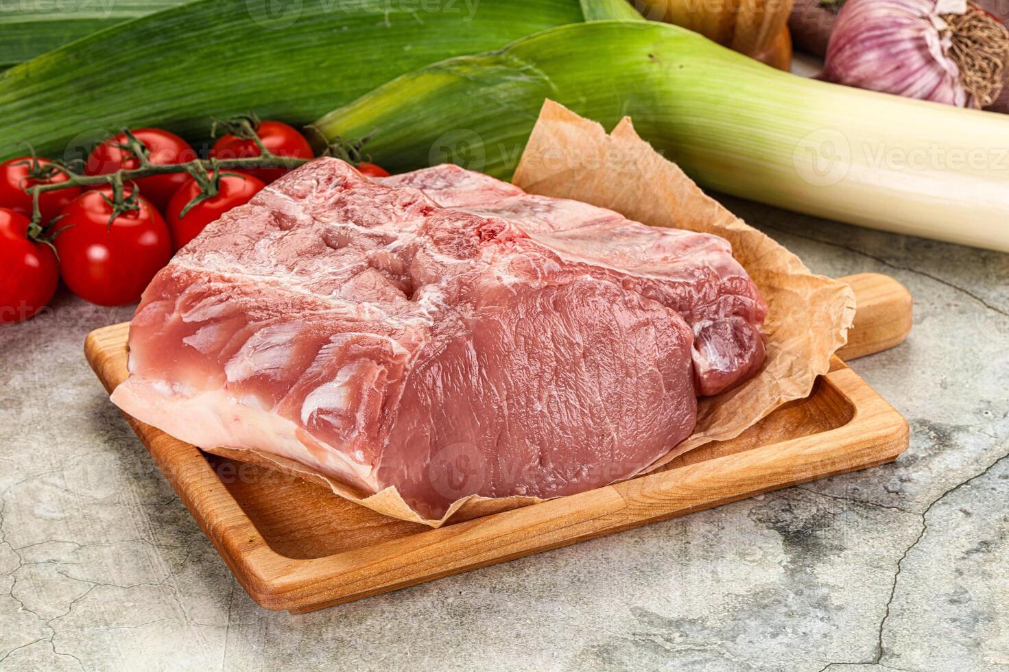 Raw pork loin cut with bone photo