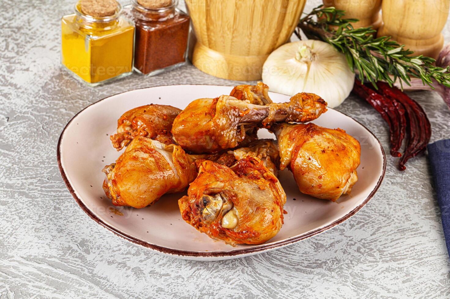 Raw marinated chicken drumstick for cooking photo