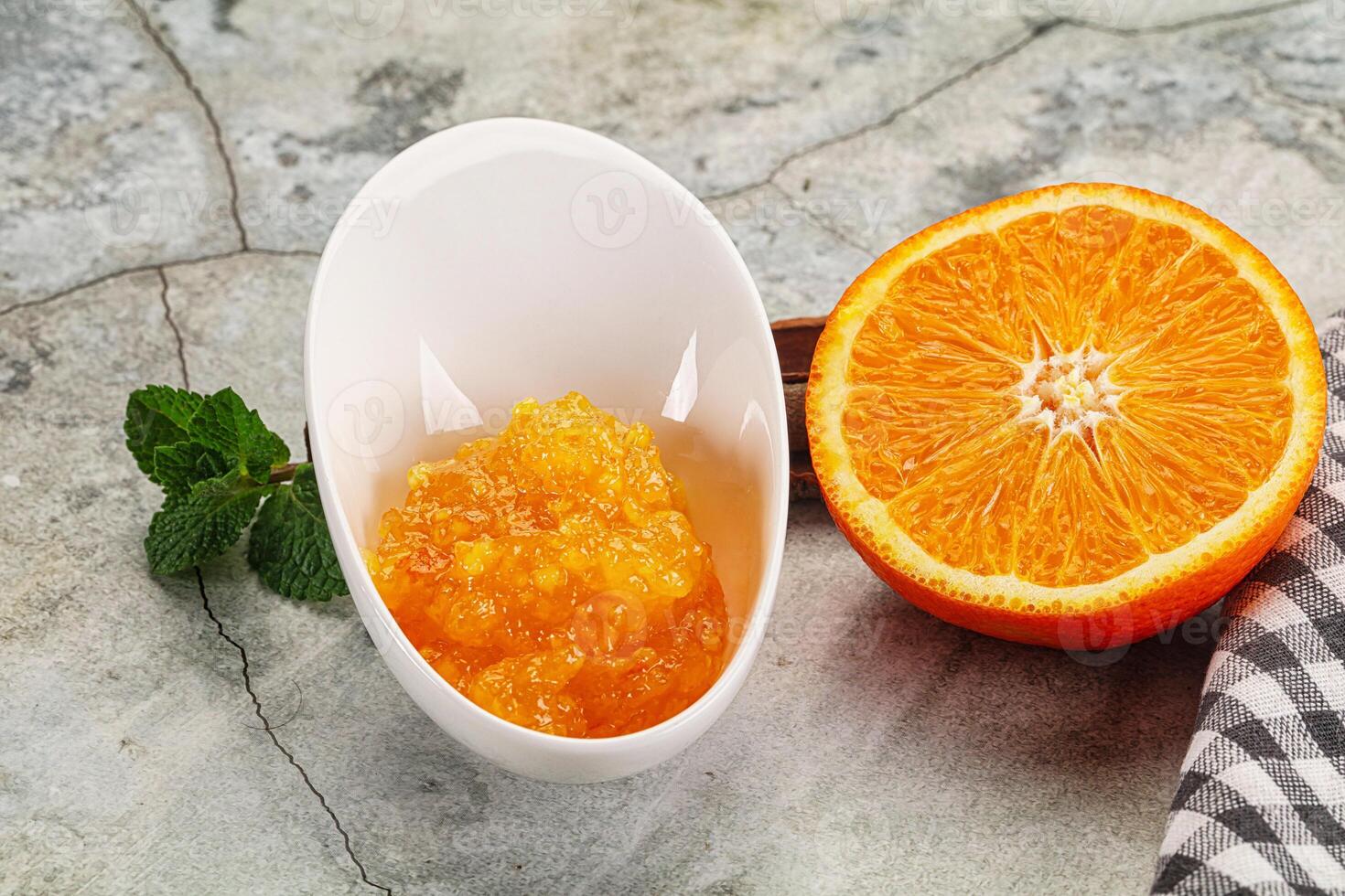 Tasty homemade Orange jam in the bowl photo