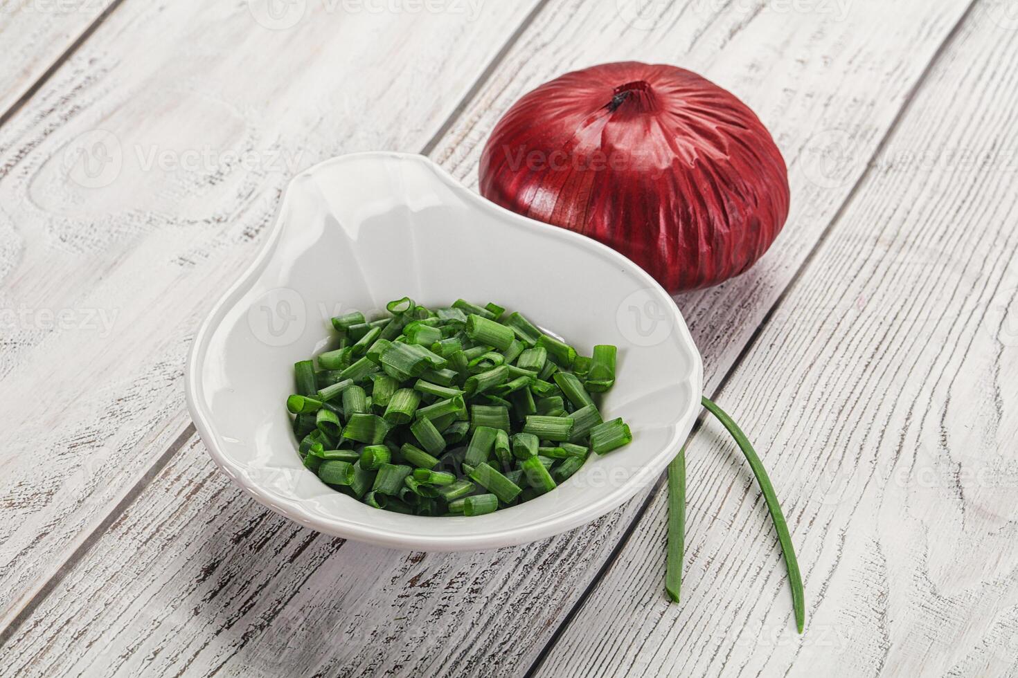 Diced green onion in the bowl photo