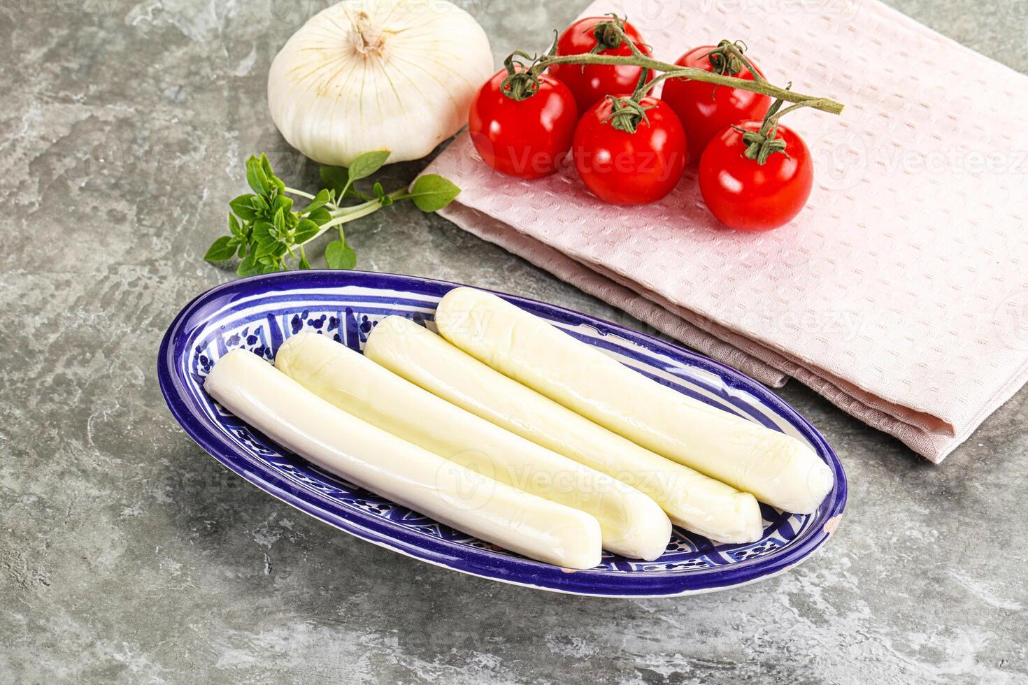 Mozzarella cheese stick heap snack photo