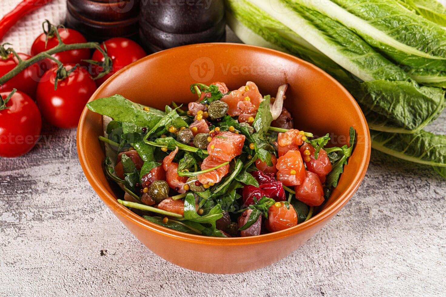Salad with salmon and arugula photo
