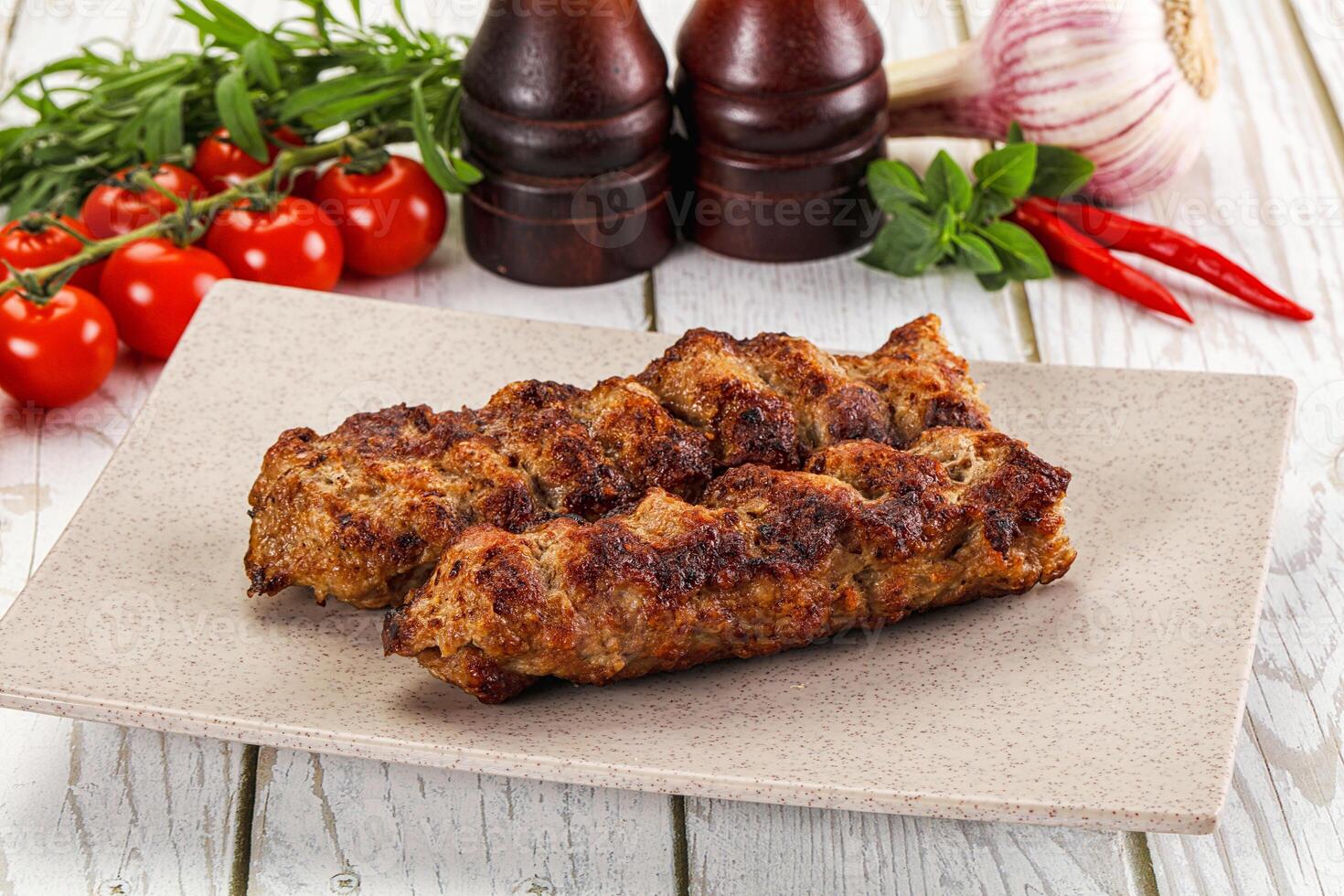 Chicken kebab minced meat and spices photo