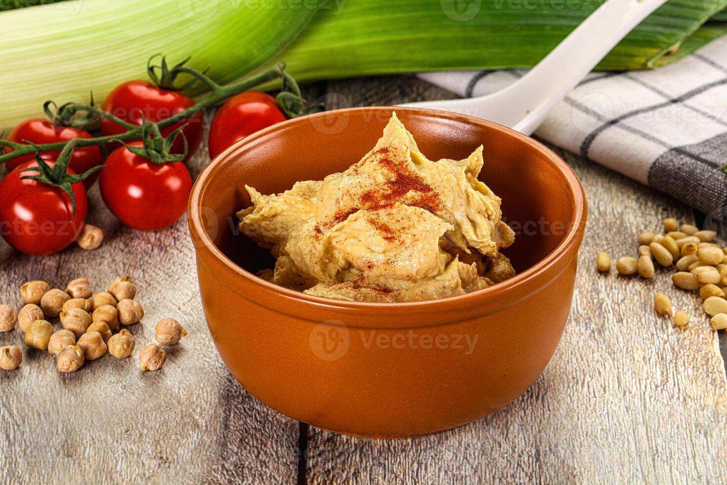 Natural chickpea hummus with paprika photo