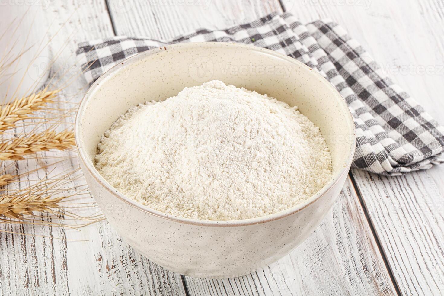 Wheat flour heap for bake photo