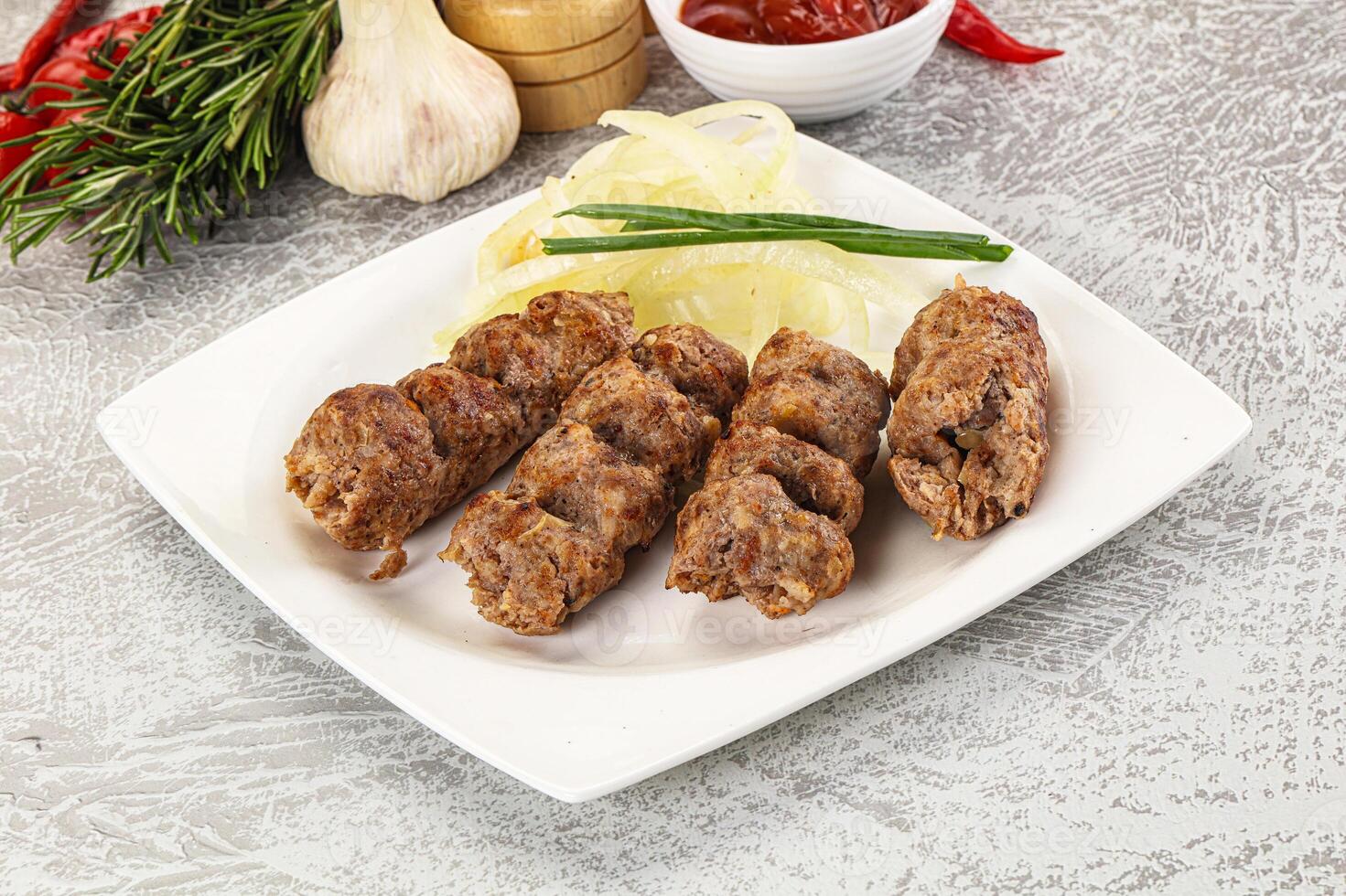 Beef kebab minced meat with onion photo