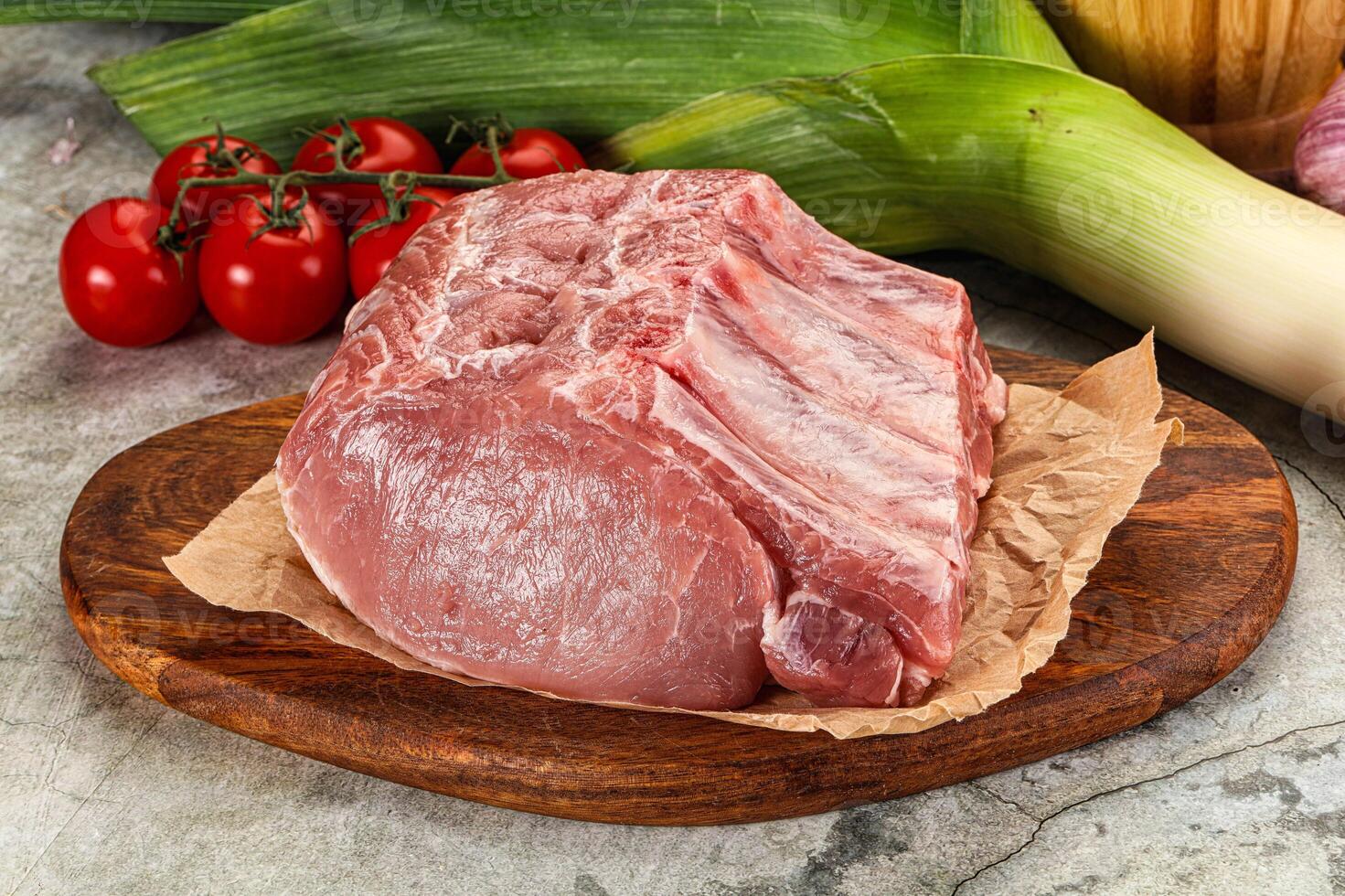 Raw pork loin cut with bone photo
