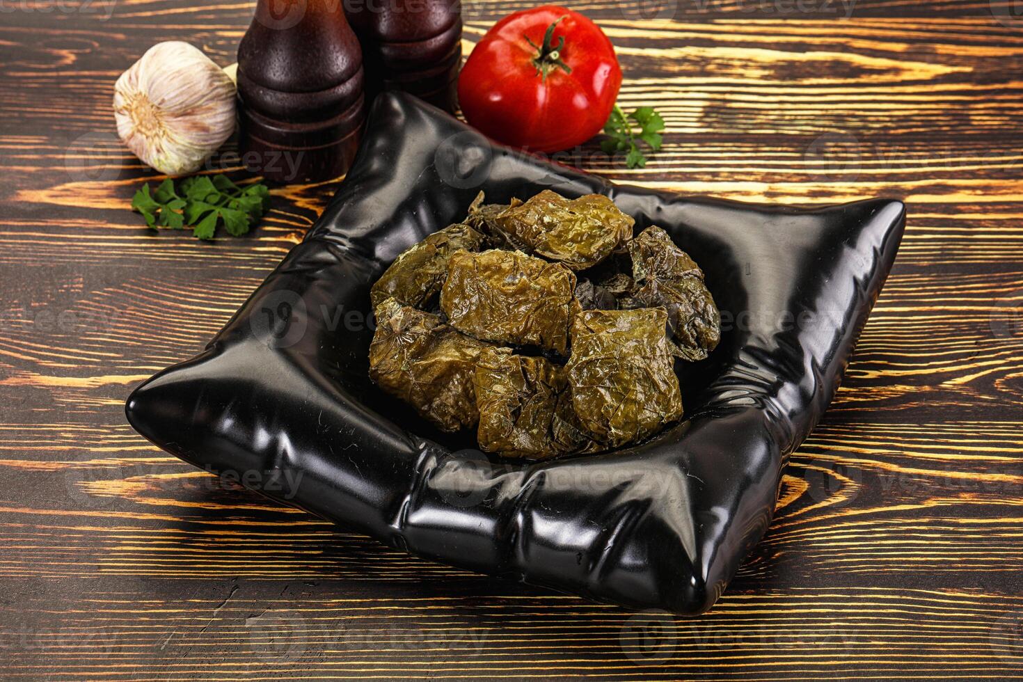 Stuffed dolma - meat in grape leaves photo