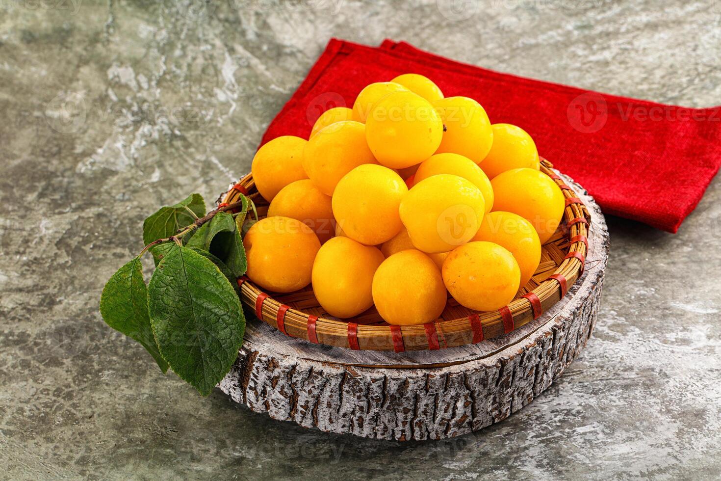 Ripe sweet juicy yellow plum photo