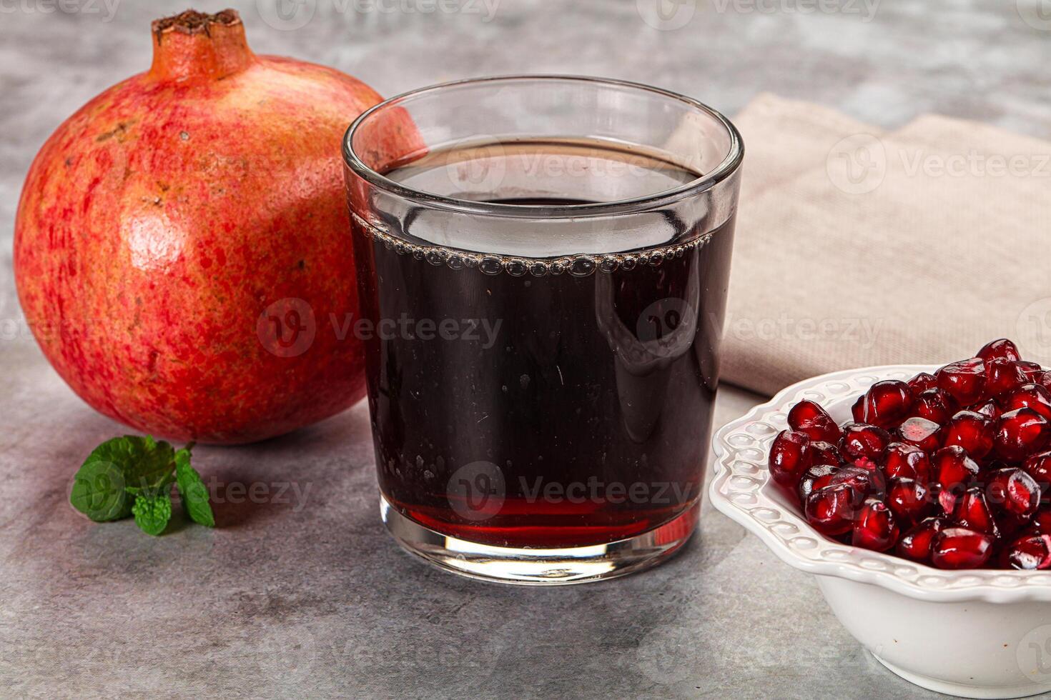 Sweet fresh pomegranate juice with fruit photo