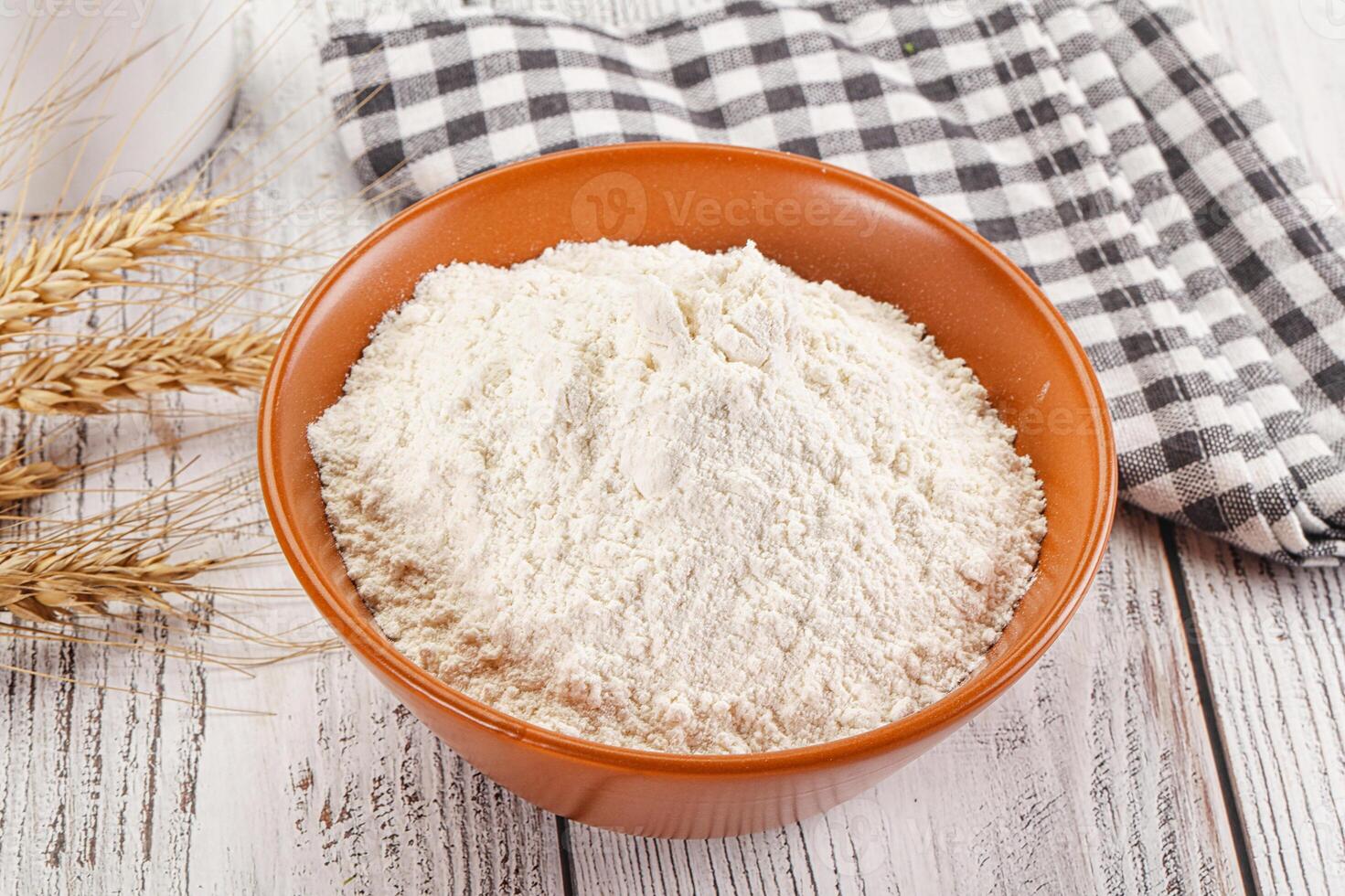 Wheat flour heap for bake photo