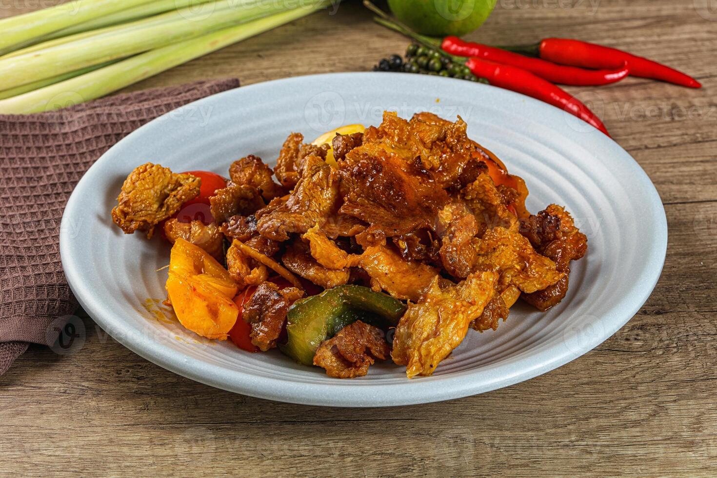 Asian cuisine - roasted crocodile meat photo