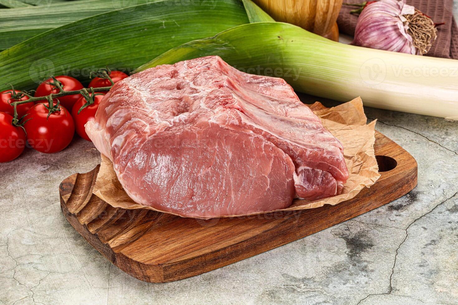 Raw pork loin cut with bone photo
