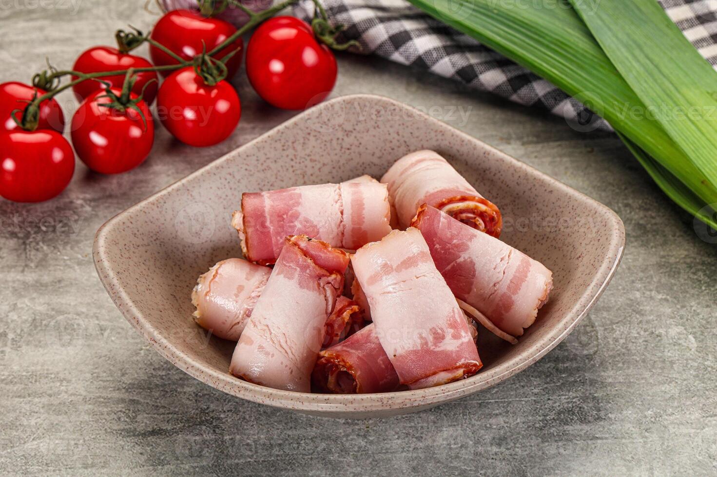 Fresh raw pork bacon roll photo