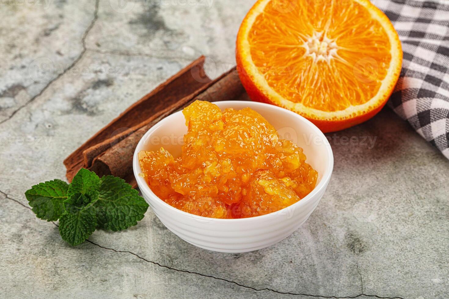 Tasty homemade Orange jam in the bowl photo