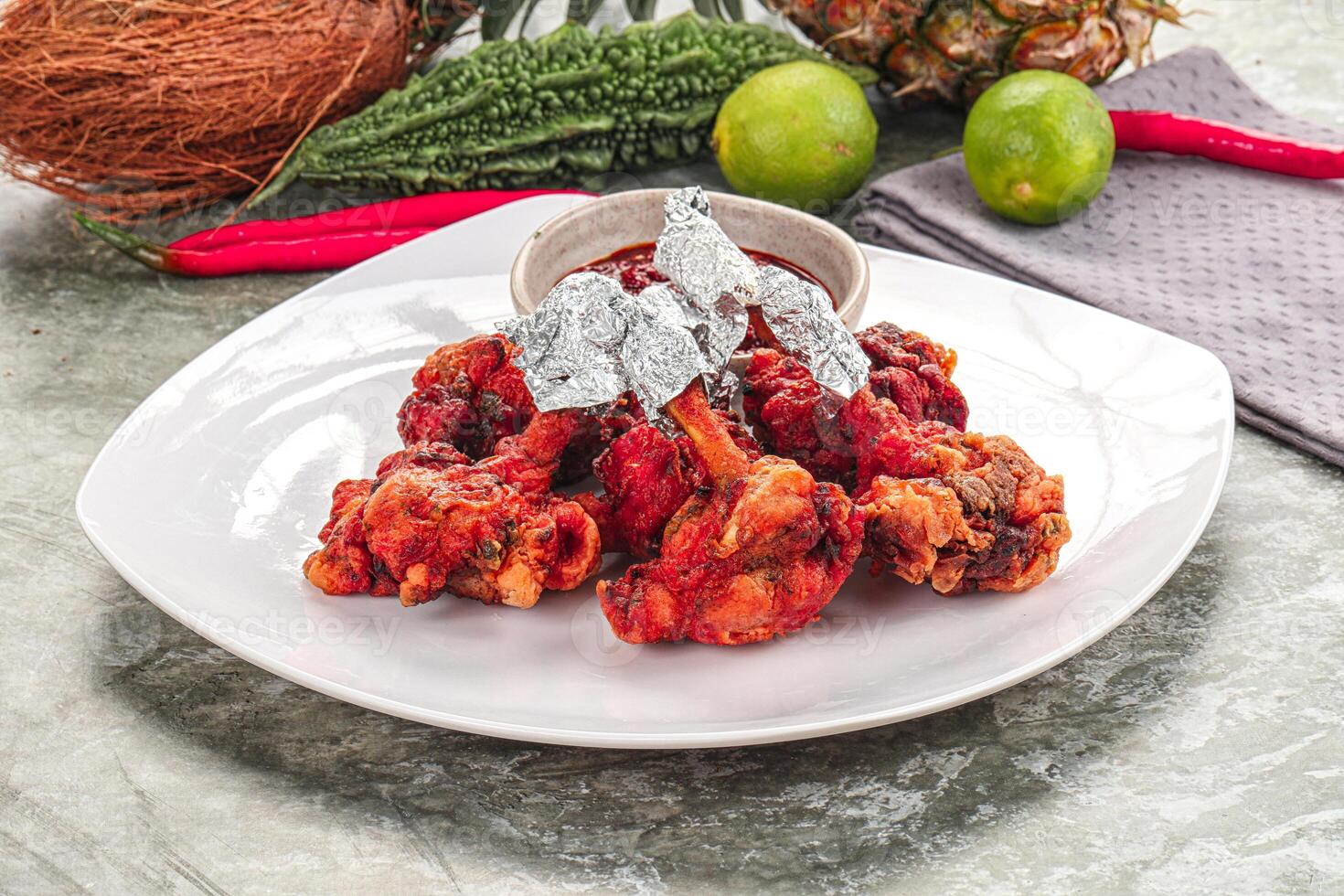 Indian cuisine - Red Chicken lolypops photo