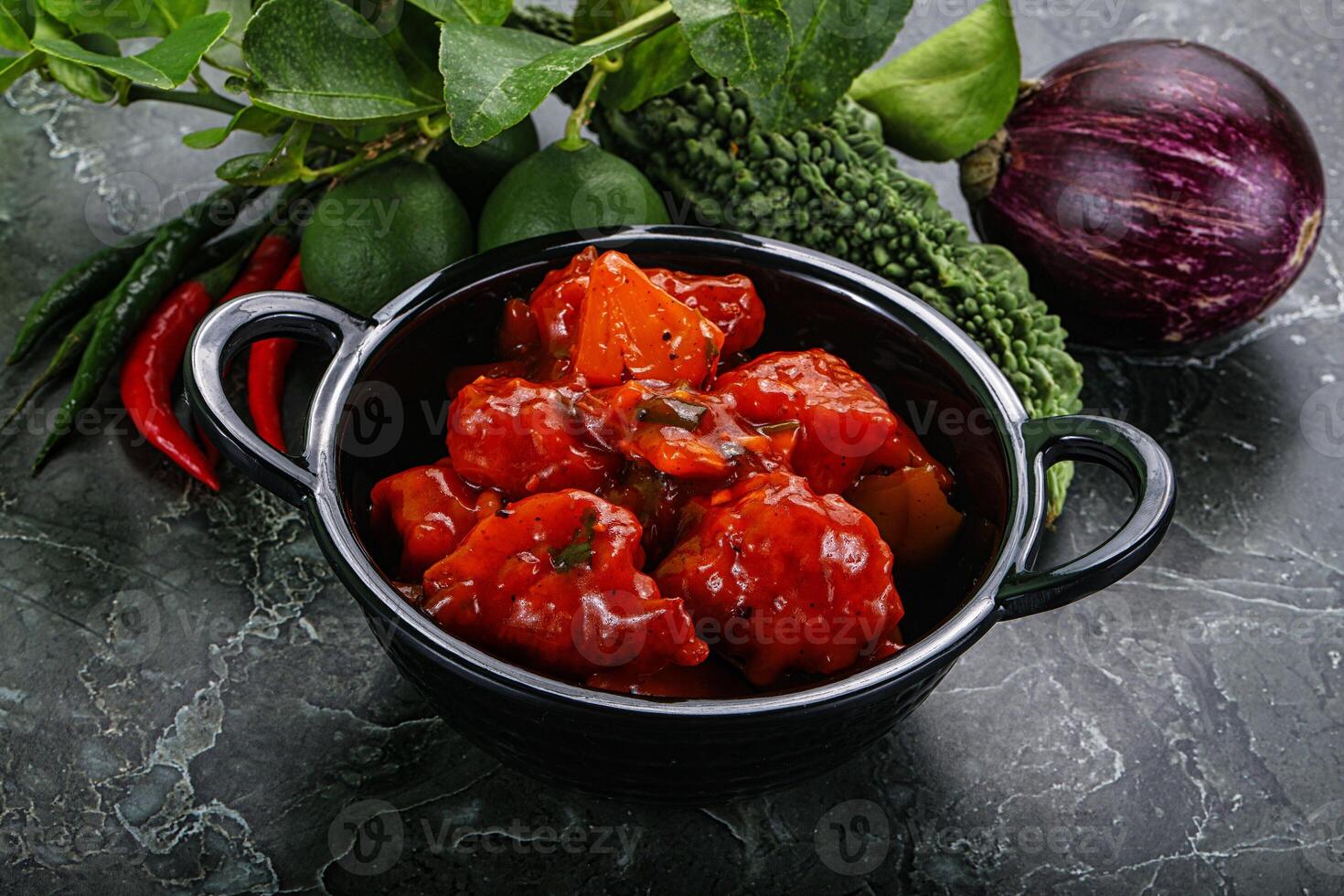 Chinese cuisine - chicken in sweet and sour sauce photo