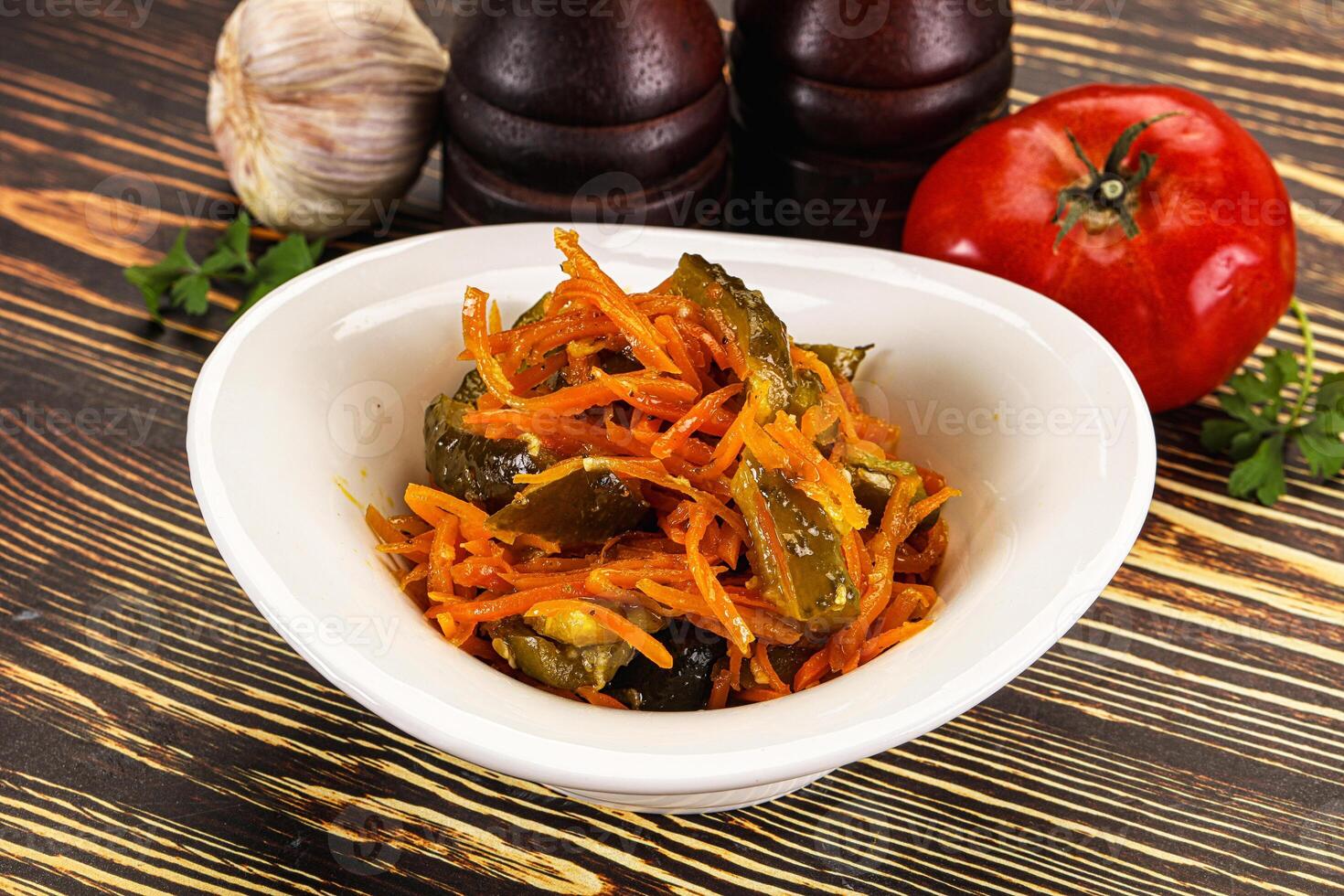 Salad with korean carrot and cucumber photo