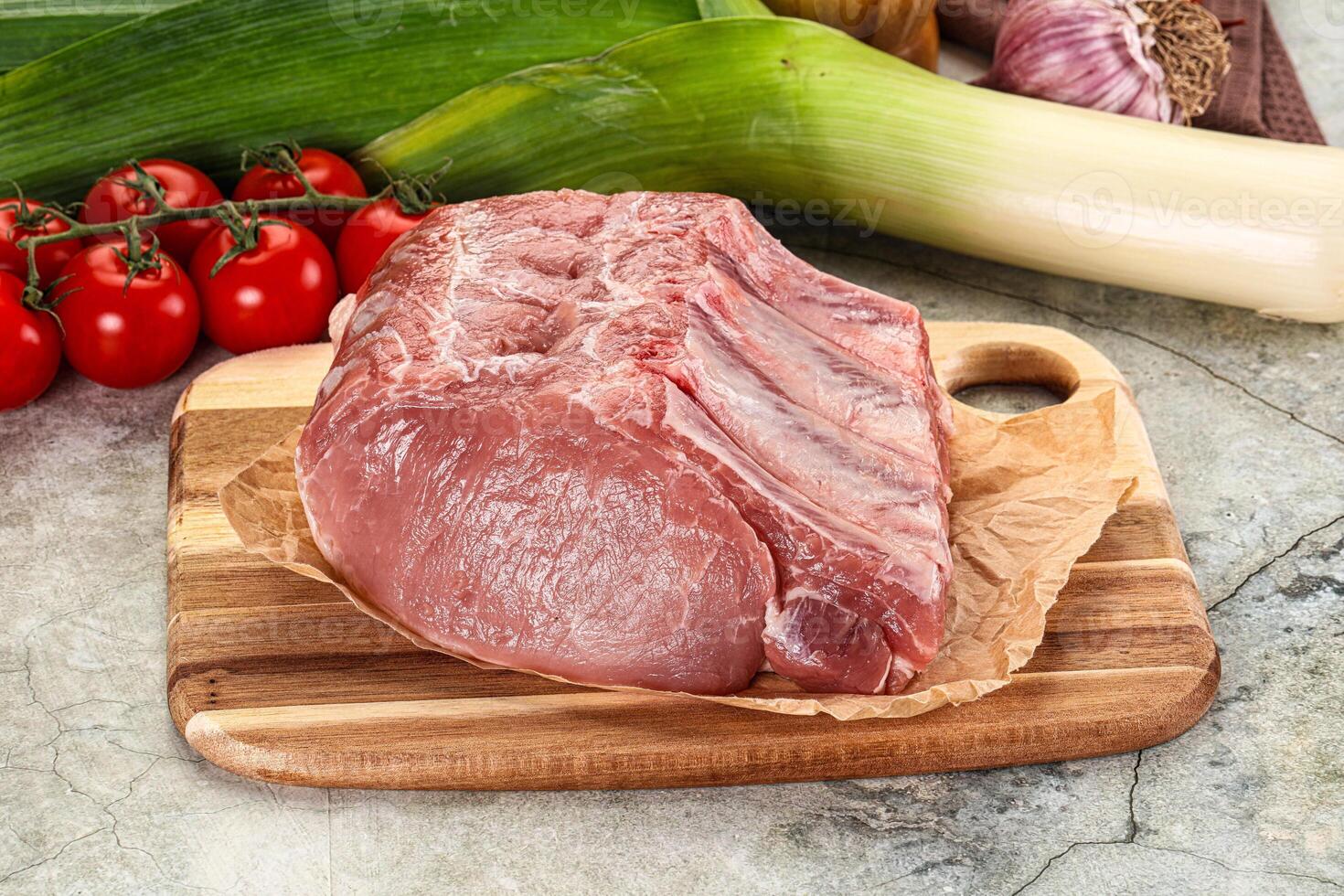 Raw pork loin cut with bone photo