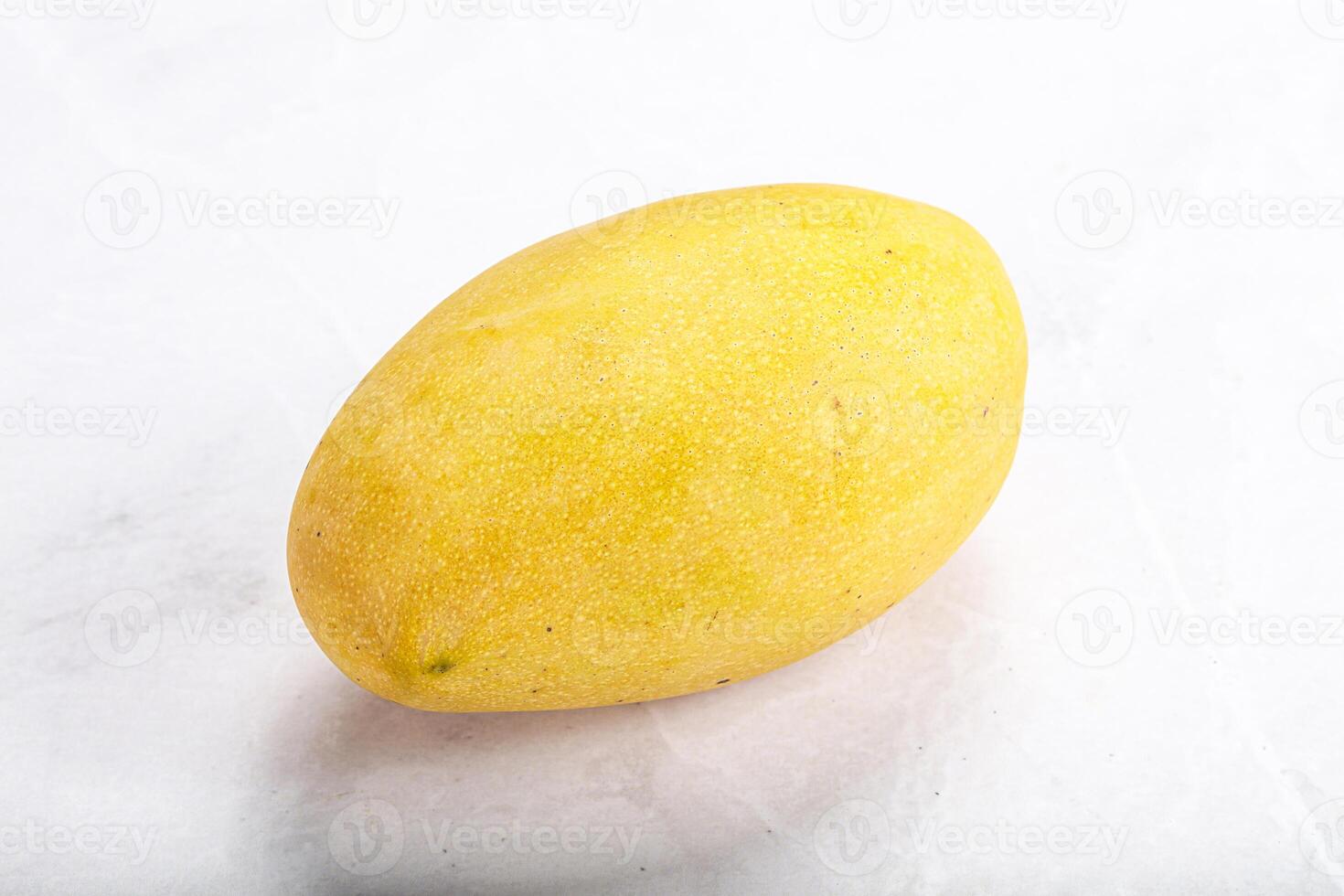 Sweet ripe juicy tropical mango fruit photo