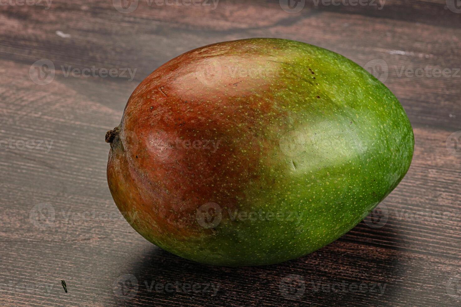 Sweet juicy green and red mango photo