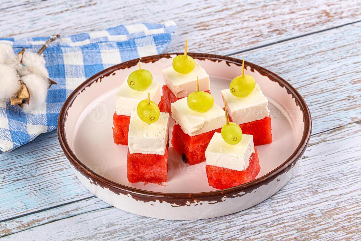 Watermelon with feta and grape photo