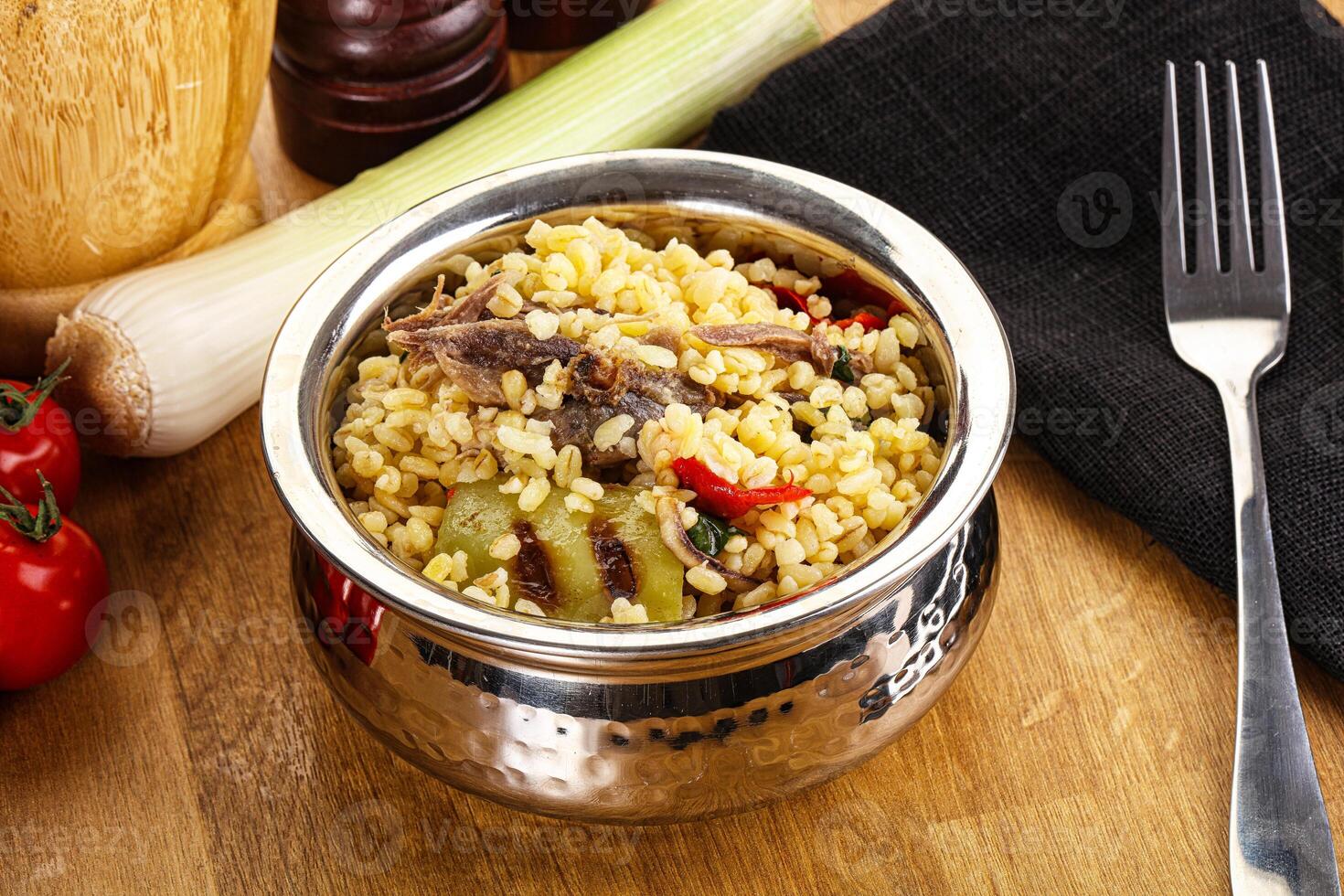 Bulgur with lamb and vegetables photo