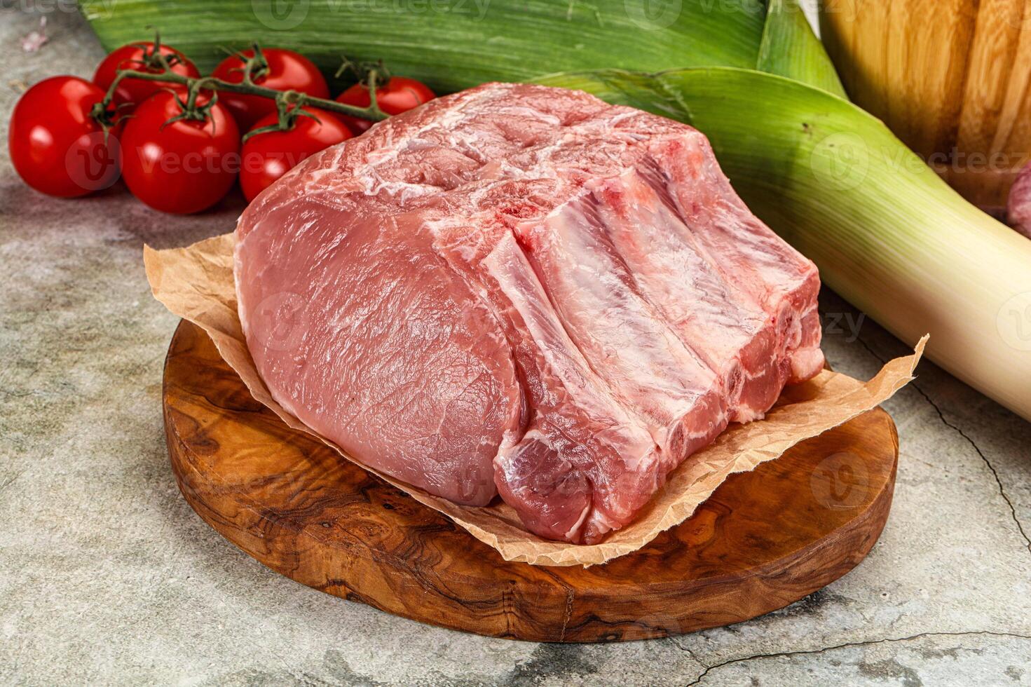 Raw pork loin cut with bone photo