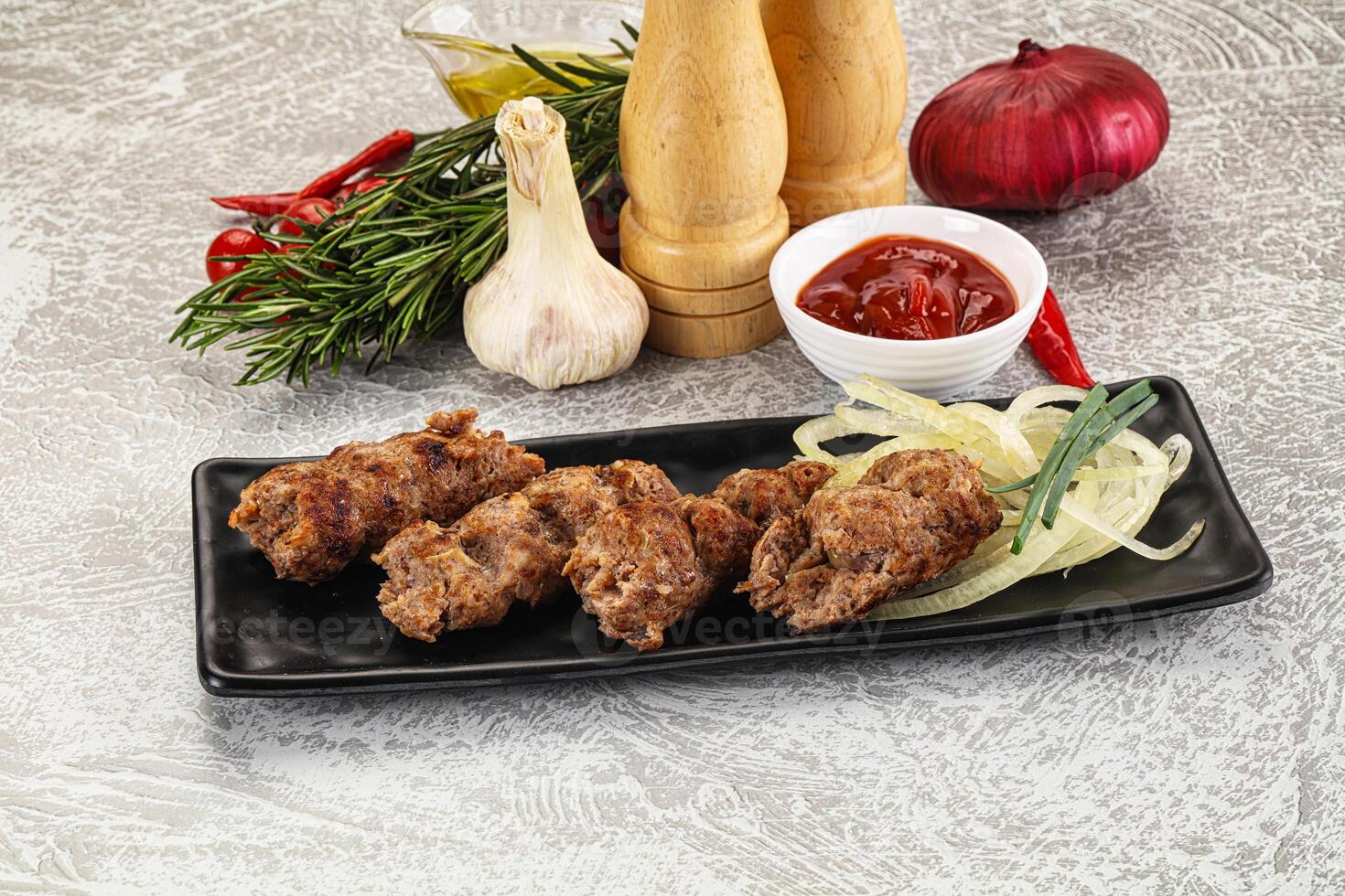 Beef kebab minced meat with onion photo