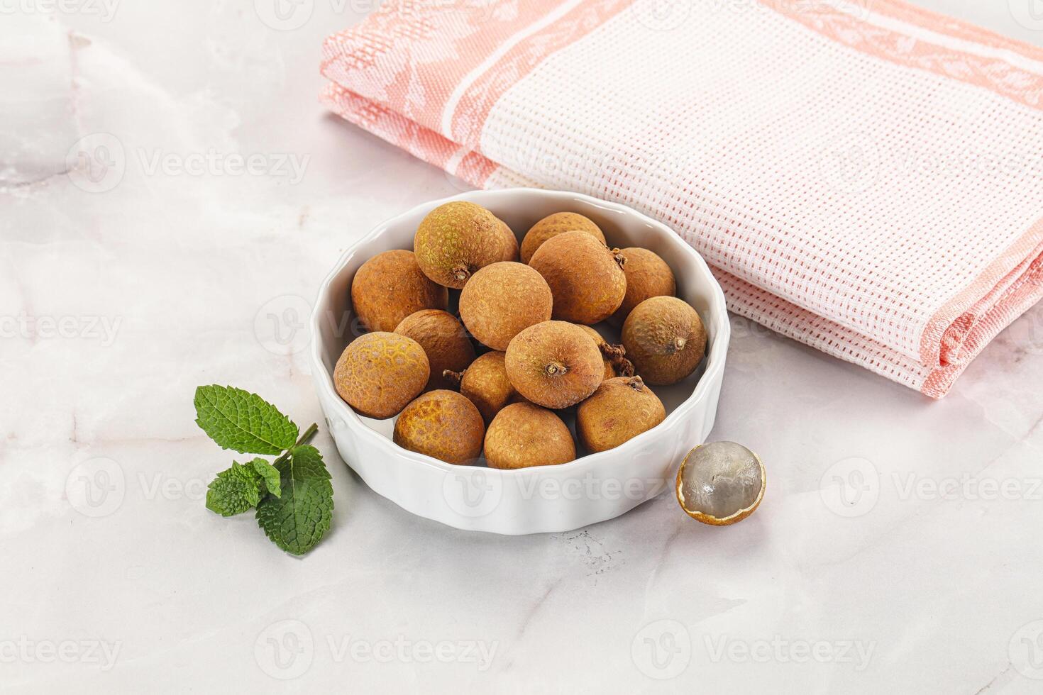 Tropical delicous fruit Longan heap photo