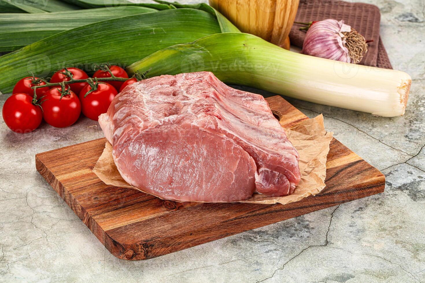 Raw pork loin cut with bone photo