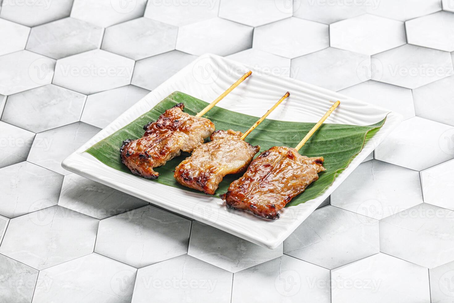 Thai cuisine - grilled pork skewer photo